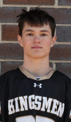 Young male athlete in uniform posing for a portrait.