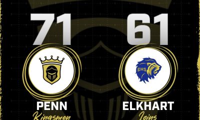 Track scoreboard with the score Penn 71, Elkhart 61