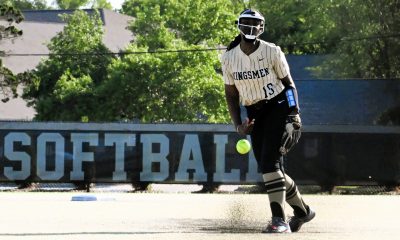 Baseball player in uniform on field.