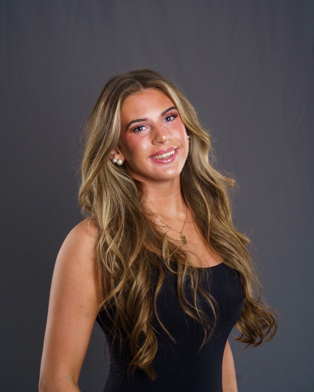 A member of a Dance team poses for a photo.