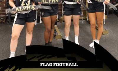 Penn Flag Football players pose for a photo.
